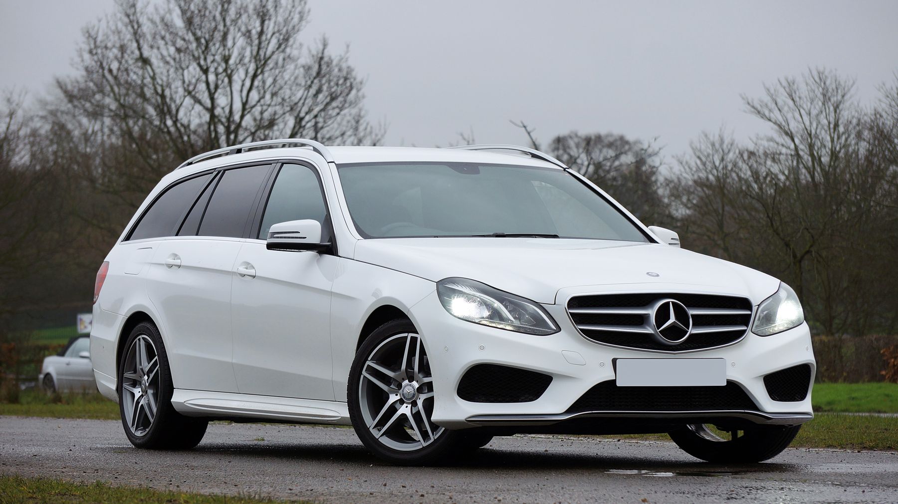 White Mercedes-Benz E-Class wagon